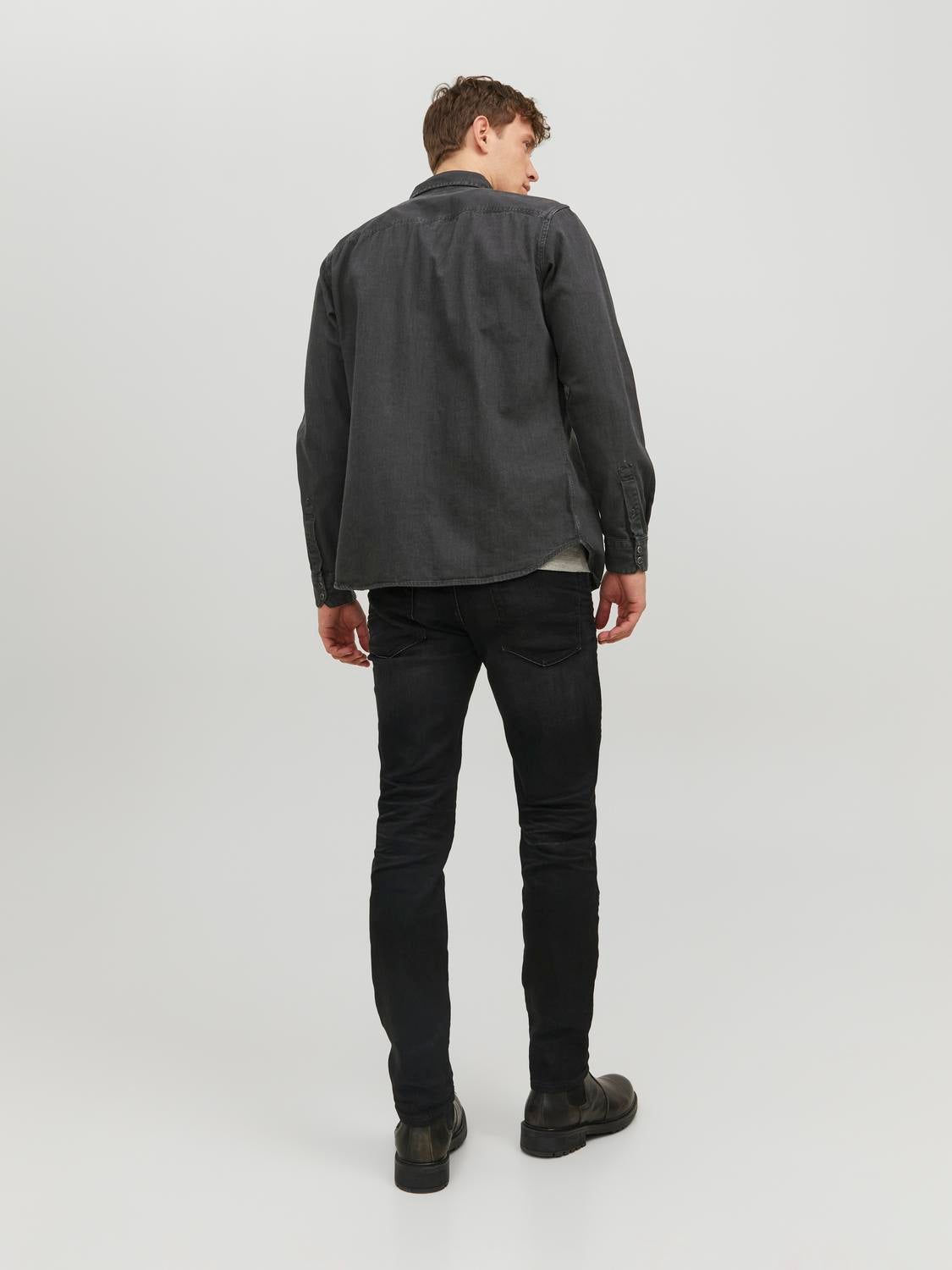 Black shirt and grey jeans on sale