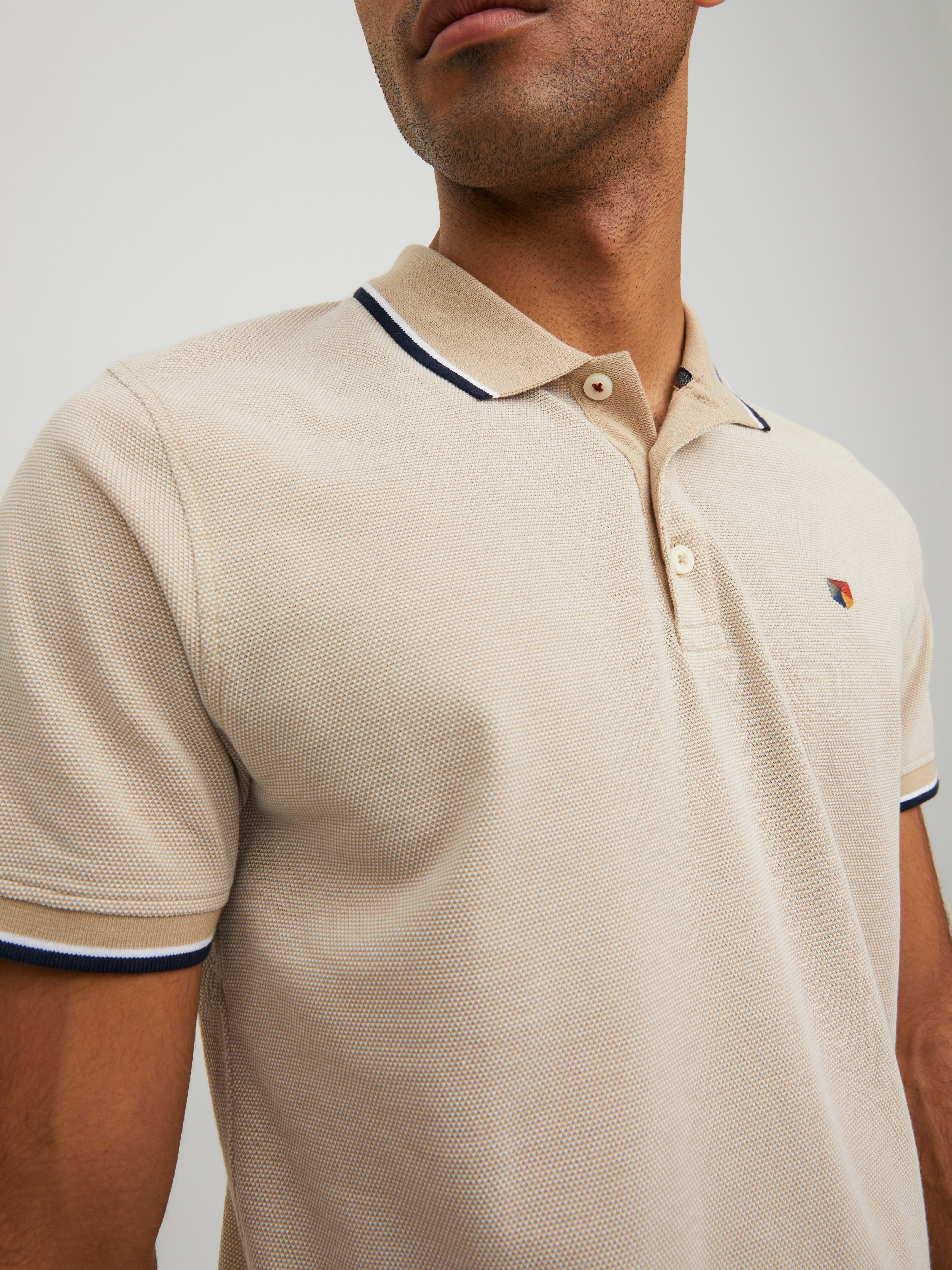cream polo t shirt