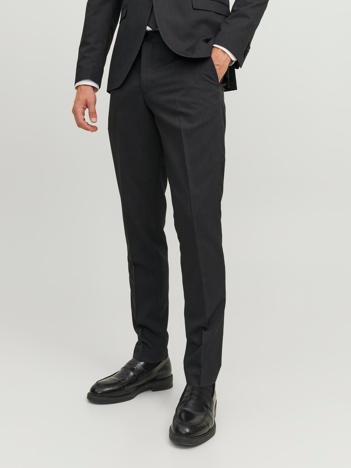 can a regular suit be tailored to slim fit
