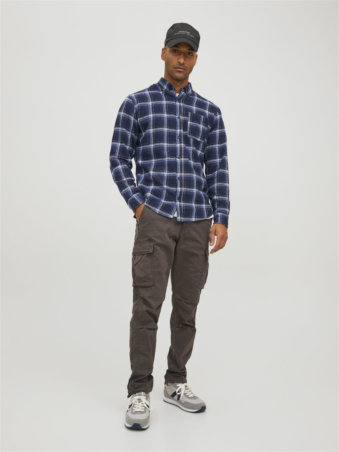 blue checkered shirt grey pants