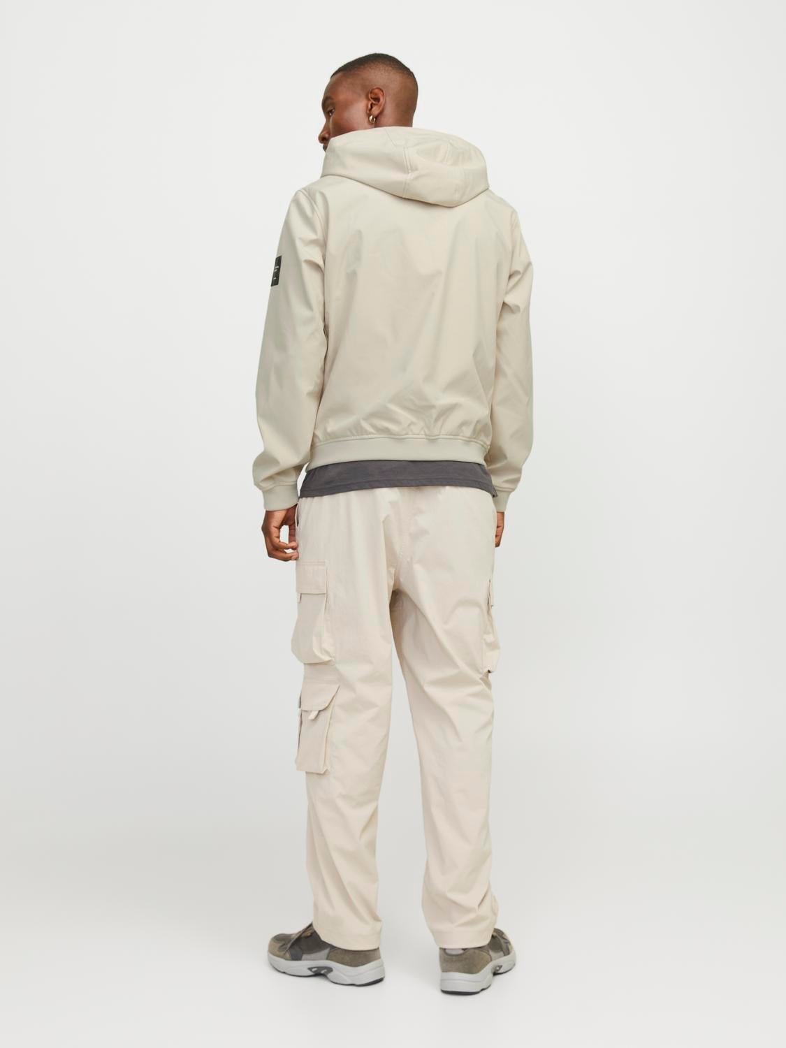 Hood with string regulation Ribbed cuffs Jacket