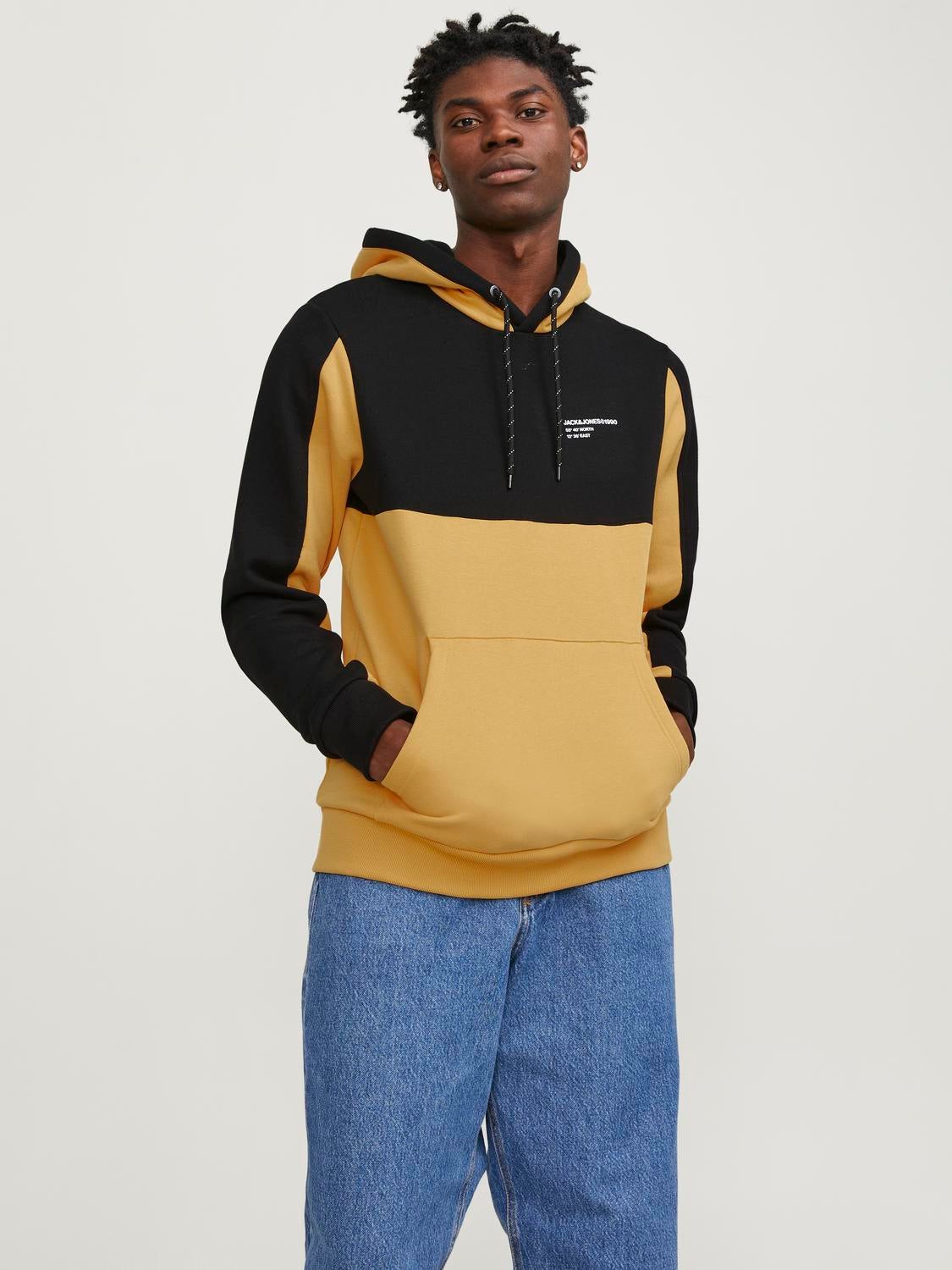 Yellow hoodie best sale with black jeans