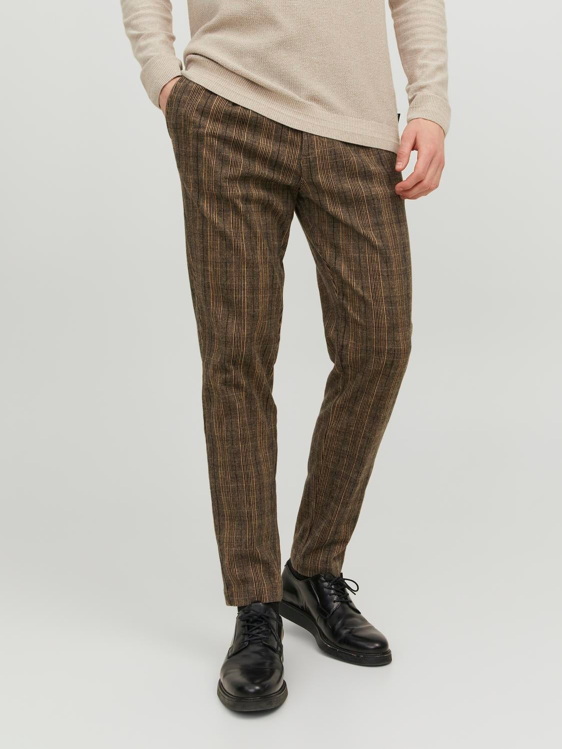Buy Louis Philippe Men Brown Carrot Fit Solid Flat Front Formal Trousers  online