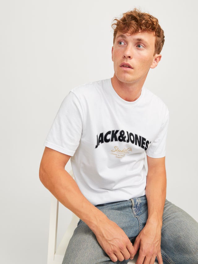 Buy Jack & Jones JCOBOOSTER Printed Crew Neck T Shirt In White | 6thStreet Qatar Buy Jack & Jones JCOBOOSTER Printed Crew Neck T Shirt In White | 6thStreet Qatar